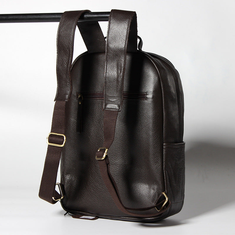 The factory sells leather double shoulders, Baotou layer cowhide, European and American men's backpack, high grade travel and leisure men's bags wholesale