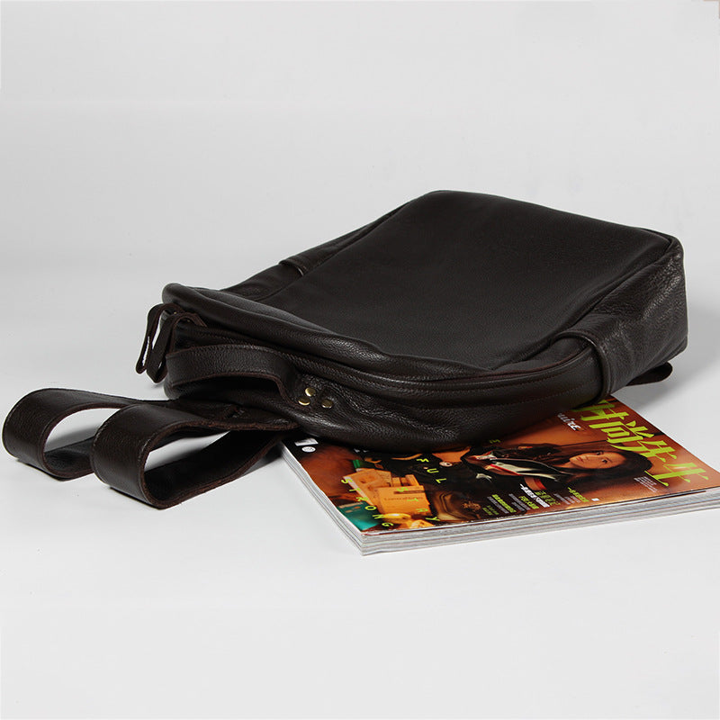 The factory sells leather double shoulders, Baotou layer cowhide, European and American men's backpack, high grade travel and leisure men's bags wholesale